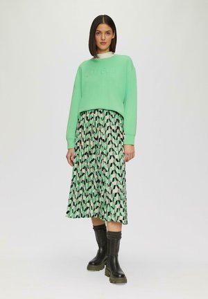 MIT ALL-OVER-PRINT - A-line skirt - hellgrün