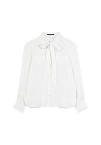 White blouse with a bow tie collar, long sleeves, two front pockets, and a button-up front. Soft, smooth fabric with slight sheen.