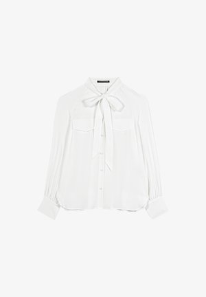 Weißes Bluse mit einer Schleifenkragen, langen Ärmeln, zwei Fronttaschen und einer Knopfleiste. Weicher, glatter Stoff mit dezentem Glanz.