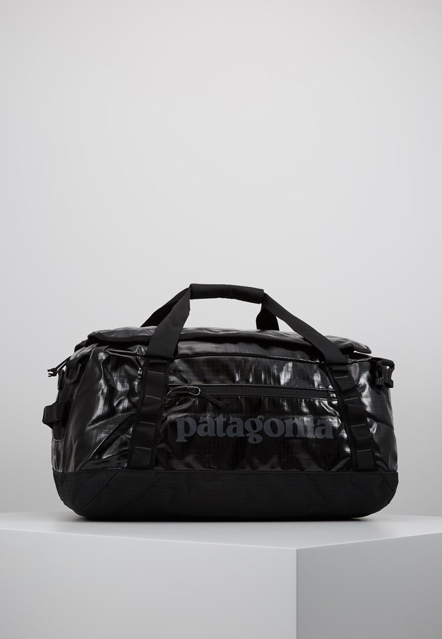 BLACK HOLE DUFFEL 40L - Sporttasche - black