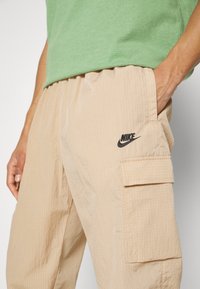 Nike Sportswear Pantaloni cargo - hemp/black