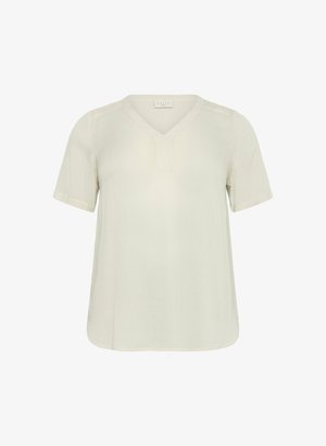 Krátky rukáv, svetlo béžová blúzka s výstrihom do V, mäkká textúra a voľný strih. Obsahuje jemné prešitie pozdĺž ramien a spodného okraja.