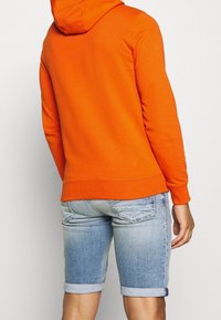 Tommy Jeans Jersey con capucha - orange