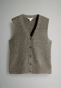Hnedá, bezrukávová pletená vesta s V-výstrihom a šiestimi hnedými gombíkmi na prednej strane. Mäkká textúra a rebrovaný dizajn látky.