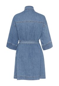 Denim dress with a collar and short sleeves. Features a belted waist and visible stitching accents. Light blue color, casual design.