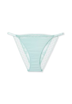 String vert menthe clair en tissu doux et lisse, orné d'une bordure en dentelle avec un motif à pois le long des bords. Fines bretelles pour un ajustement réglable.