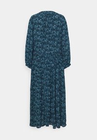 Robe midi à manches longues bleu foncé avec motif floral bleu clair, taille froncée et coupe ample, vue de dos sur fond blanc.
