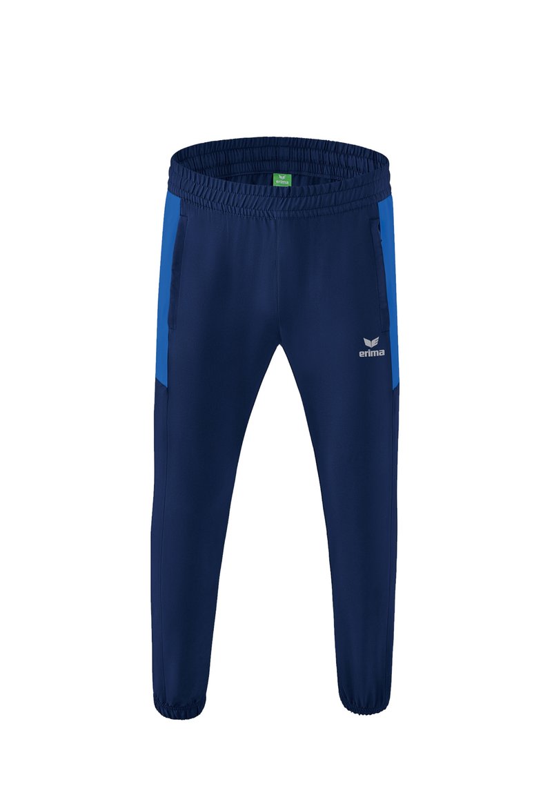 Marineblauwe sportbroek met een elastische tailleband, voorzien van blauwe zijpanelen, ritszakken en een logo op het rechterbeen aan de voorkant.