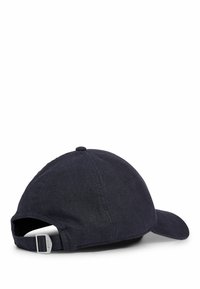 Dark blue baseball cap with a curved visor, made of textured fabric. Features an adjustable strap with a metal clasp at the back.