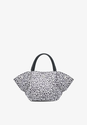 Czarna i biała torebka w kropki z szerokimi skrzydłami i czarnymi uchwytami, z małym srebrnym logo na środku przodu.