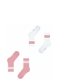 Rosa und weiße Baumwollsocken mit kontrastierenden Streifen. Eine rosa Socke hat zwei weiße Streifen, während die weiße Socke zwei rote Streifen aufweist.