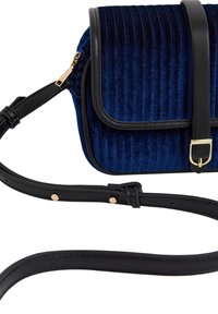 Navy blue velvet crossbody bag with a ribbed texture, black leather accents, and a gold-tone buckle on the flap closure. Adjustable strap included.