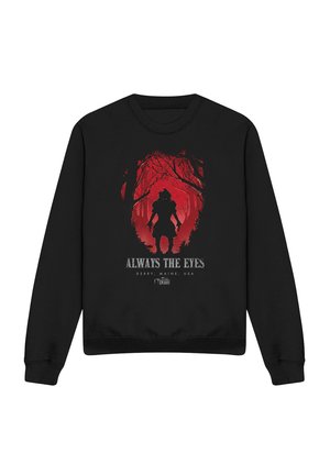 Black sweatshirt with red graphic of a silhouetted figure in a forest and text "Always The Eyes, Derry, Maine, USA."