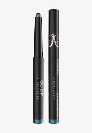 Schwarzer und türkisfarbener Anastasia Beverly Hills Glidr Shadow Stick, Farbton Sirena, mit einem Stift geschlossen und einem freigelegten Stift.