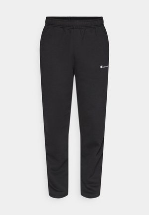 Pantalon de survêtement noir en mélange de coton, avec une taille élastique et un petit logo blanc sur le côté gauche. Conception à jambes fuselées.