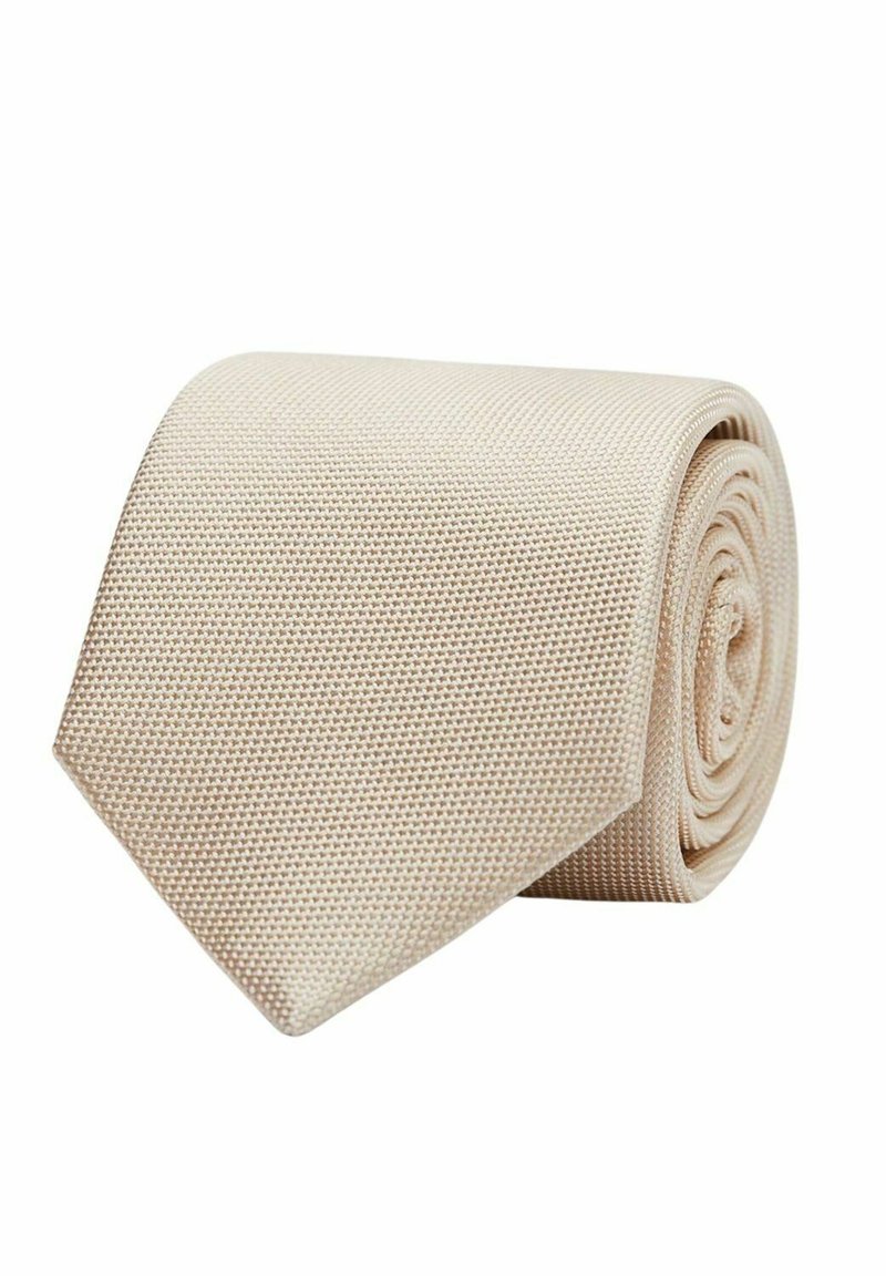 Beige texturerat slips, rullad med en spetsig ände. Tyget har ett vävt mönster som ger ett subtilt men distinkt utseende.