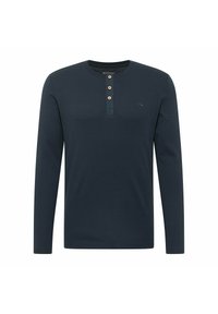 Laivastonsininen, pitkähihainen napillinen paita, valmistettu pehmeästä kankaasta, jossa on kolmen napin lista, hillitty logokoriste ja yksivärinen muotoilu.