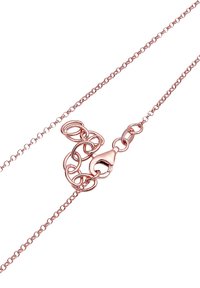 Rose guld kædedesign med sammenkoblede løkker, en lille lobsterlås og et fint link design for et elegant udseende.