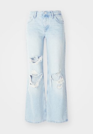 Lichtblauwe wijdneemende jeans van denim, met meerdere versleten scheuren en franjes. Klassiek ontwerp met vijf zakken en een knoopsluiting.