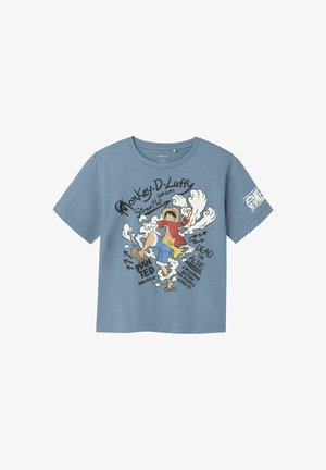 T-shirt en coton bleu avec un graphique imprimé de Monkey D. Luffy, texte, manches courtes et col rond.