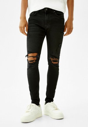 SUPER RIPPED - Jeans Skinny Fit - black