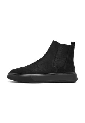 Black suede ankle boots with elastic side panels, round toe, and rubber sole. Features textured pattern and small rear pull tab for easy wear.