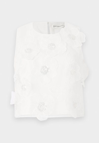 Top bianco senza maniche con fiori ricamati, dettagli in perline e una texture liscia. Chiusura sul retro con una piccola zip discreta.