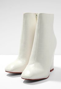RAID Stivaletti con tacco - white