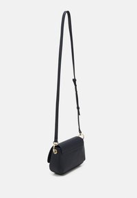 Tommy Hilfiger EMBLEM FLAP CROSSOVER - Borsa a tracolla - space blue