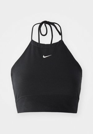 Čierny halter crop top vyrobený z elastickej látky, s jemným bielym logom Nike, s viazaním na uzol a bezšvovým dokončením.