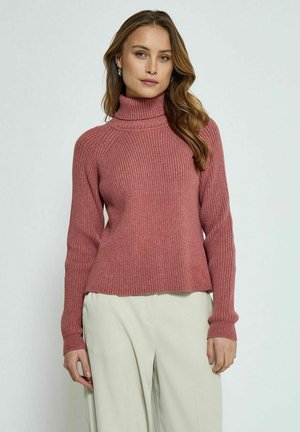 Ribbed pink turtleneck sweater with long sleeves, featuring a slightly relaxed fit and textured fabric against a plain background.