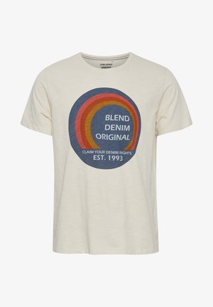 Camiseta de algodón crema con un gráfico circular multicolor y texto: "BLEND DENIM ORIGINAL" y "CLAIM YOUR DENIM RIGHTS EST. 1993."