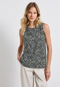 Ärmelloses Oberteil in Dunkelblau mit weißem Zebra-Streifenmuster, mit rundem Ausschnitt und lockerer Passform, aus leichtem Stoff gefertigt.