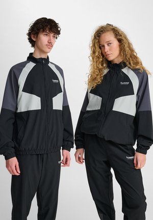 Hummel TRACK ZIP - Ελαφρύ μπουφάν - black