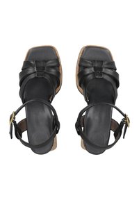 Sandali in pelle nera con punta quadrata, design a cinghie incrociate e cinturino alla caviglia con fibbia dorata. Soletta con texture in sughero.