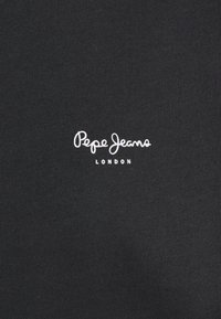 Felpa in cotone nera con logo bianco "Pepe Jeans" e testo "LONDON", con una texture liscia e design in tessuto a coste.