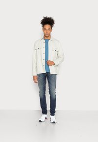Diesel SLEENKER - Calças de ganga de corte skinny - 069yy 01