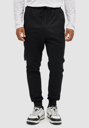 INSIDE DEPORTIVO JOGGER - Pantalones deportivos - black