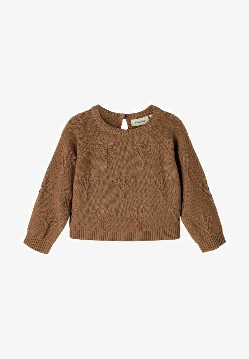 Pull marron en maille avec broderie en forme de fleur, col rond, manches longues et détail à boutons dans le dos. Tissu texturé avec ourlet côtelé.