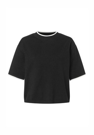 Pull-over noir à manches courtes avec un col rond côtelé et un bord blanc aux manches. Tissu doux, coupe décontractée et ourlet droit.