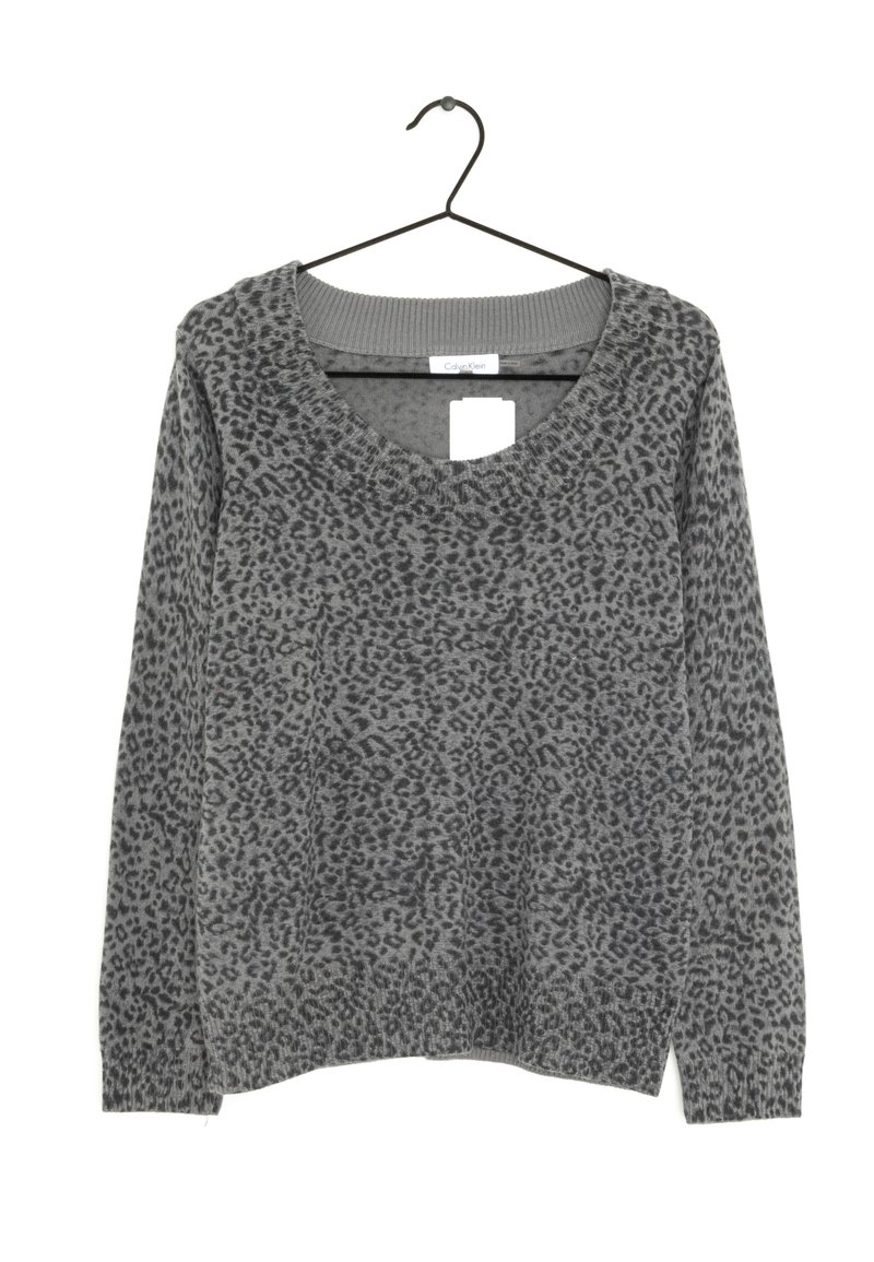 Gray sweater featuring a V-neck, long sleeves, leopard print pattern, and ribbed cuffs and hem. Hangs from a black hook.