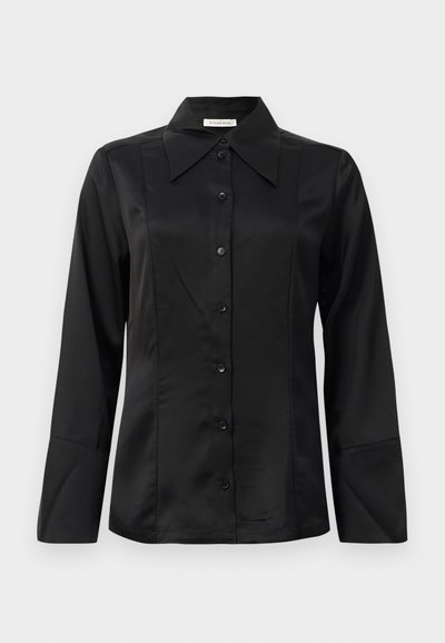 Black satin blouse with a pointed collar, long sleeves, front button closure, and fitted design. Smooth texture with seam detailing.