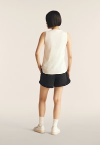 Freddy REGULAR FIT IN CON INSERTO PAILLETTES - Top - nero