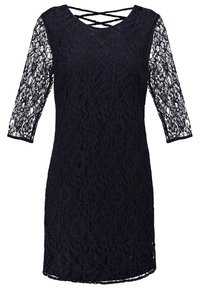 Mörkblå spetsklänning med trekvartslånga ärmar, blommönster, rundad halsringning och korslagda remmar på baksidan. Mjuk textur.