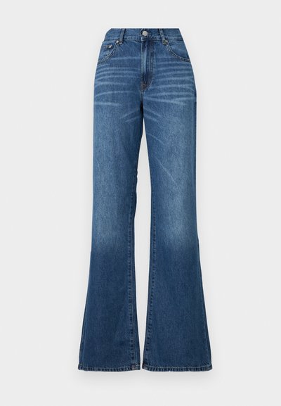 Wide-leg jeans made of medium-wash denim. Features a high waist, front button closure, and minimal fading. Straight cut from thigh to hem.