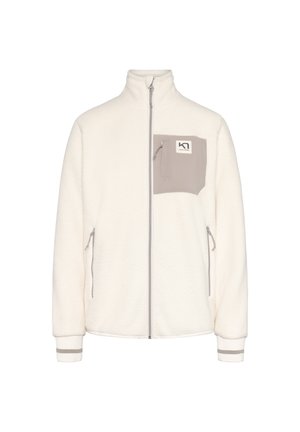 Veste polaire blanche à fermeture éclair intégrale avec col montant, poche poitrine beige zippée avec logo, et poches latérales zippées.