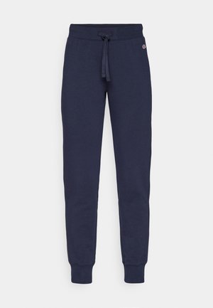 Pantaloni tuta blu navy realizzati in materiale morbido, con vita regolabile tramite coulisse, gambe affusolate e polsini a costine. Piccolo logo sul fianco.