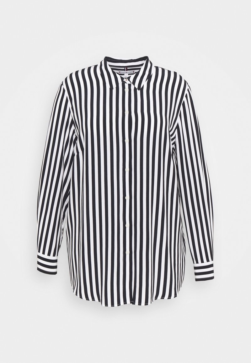 Zwart-wit verticaal gestreept overhemd met lange mouwen, kraag en volledig knoopsluiting, met contrasterende gestreepte manchetten.