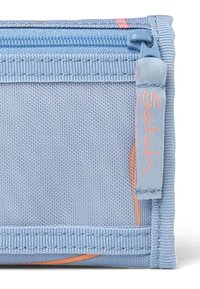 Light blue fabric pouch with a textured surface, featuring a pink "Satch" logo tag and an orange accent pattern along the edge.