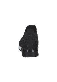Zapatillas deportivas negras con un upper texturizado y brillante, suela acolchada y una media suela blanca en contraste. Presentan una lengüeta para facilitar su uso.